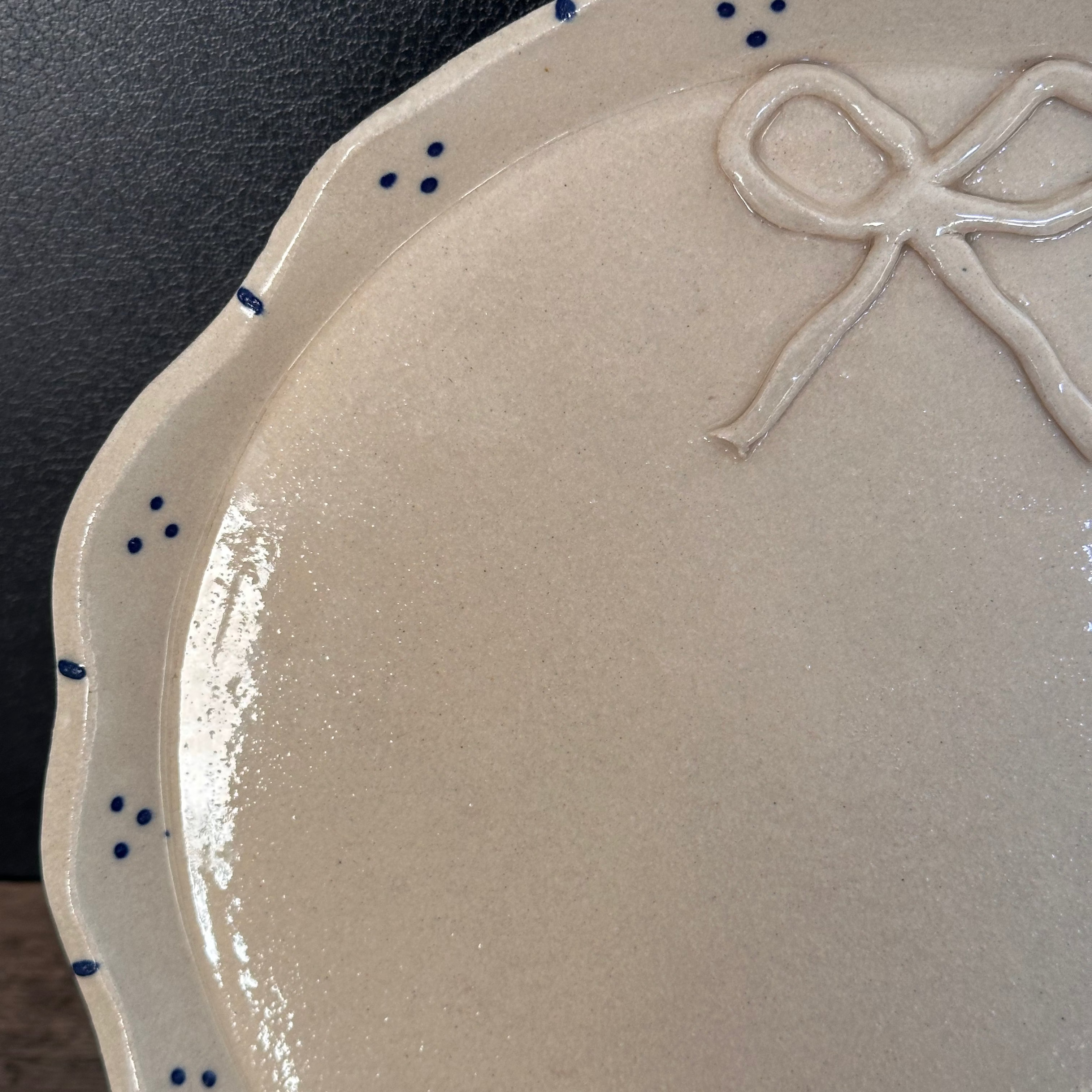 Blue and White stoneware Handmade Platter with Ribbon design and a scalloped rim functional and decorative